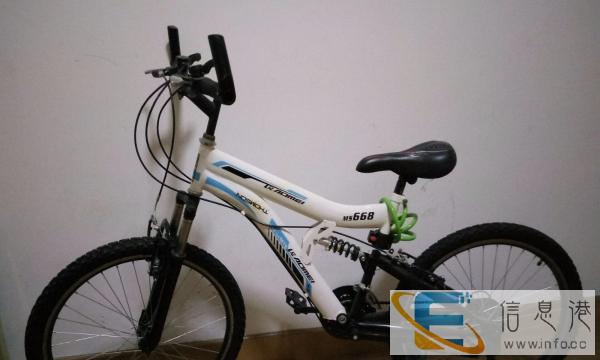 出售一台9.5新山地自行车，性能出色价格优惠